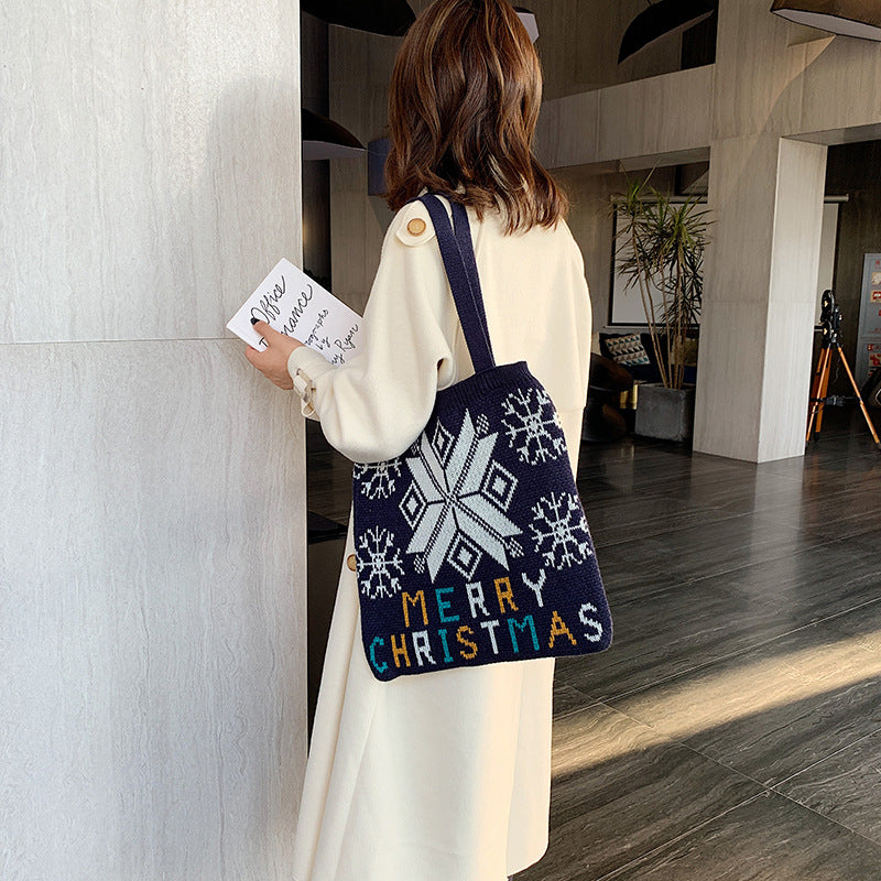 Hand-held knitted wool handbags