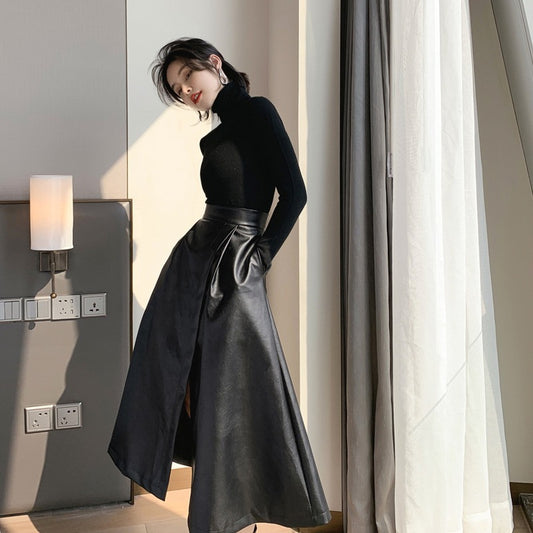 Black Mid-length Skirt With A High Waist And Slimming Hips